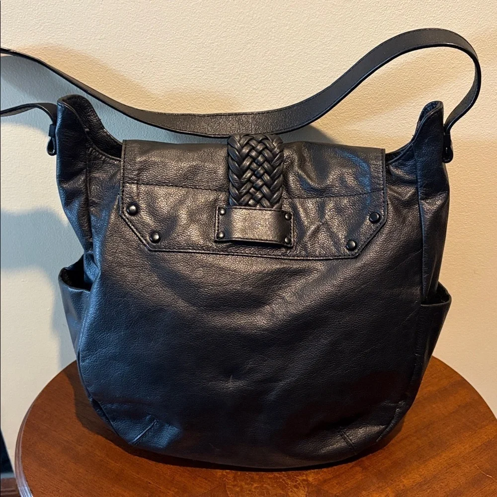 Elliott Lucca  shoulder bag  leather black  braiding & large tassel front  NWOT